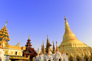 panorama view to the most famous and biggest Shwedagon pagoda with group of golden stupes beside in Yangon, Myanmar (Burma)