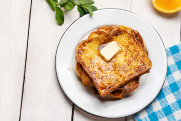 French toast with cinnamon on white background