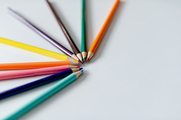 Colored pencils in a semi-circle horizontal 