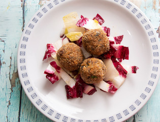 Sardine meatballs with radicchio and belgian salad