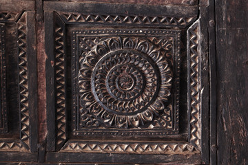 Details of old carved indian door in Rajasthan