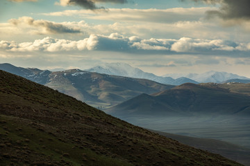 mountain under abstract sky