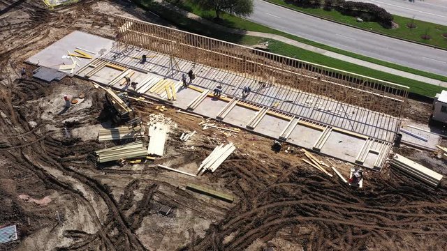 Carpenters Framing a Wall of Garage Doors, Bryan, Texas, USA