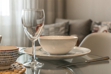 Kitchen interior with tableware, plates and glass