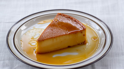 side view of a caramel flan