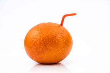 Isolated Grapefruit juice. A whole Red Grapefruit with orange straw, concept of natural fresh fruit...