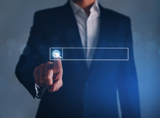 Businessman clicking internet search page  touch screen. Searching browsing internet data, information networking, search new job Concept..