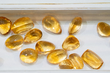 Semiprecious yellow topaz stones in jewellery gem factory, Sri Lanka