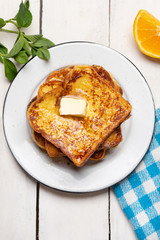 French toast with cinnamon on white background