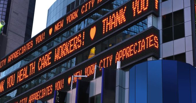 A fictional Times Square stock market ticker thanks frontline healthcare workers during the COVID-19 pandemic of 2020. Custom messages available upon request.  	