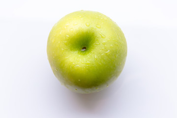Juicy green apple on a white background