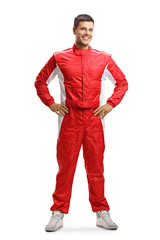Male racer standing and smiling at the camera - obrazy, fototapety, plakaty
