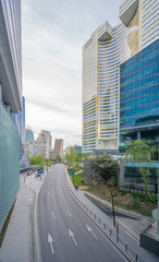 Courbevoie, France - 04 16 2020: Panoramic view of the Defense circular boulevard district at sunset