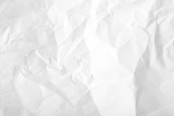 Crumpled wrinkled white office paper background, texture of writing paper with wrinkles