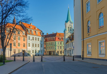 Fototapeta na wymiar APRIL 23, 2020 - RIGA, LATVIA: Empty streets of Old Town, city center in coronavirus COVID-19 pandemic quarantine time