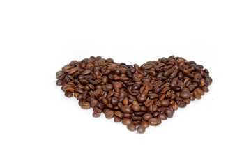 heart on a white background made of coffee beans.