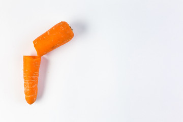 Broken One carrots isolated on white background