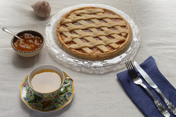 Afternoon tea break with jam tart