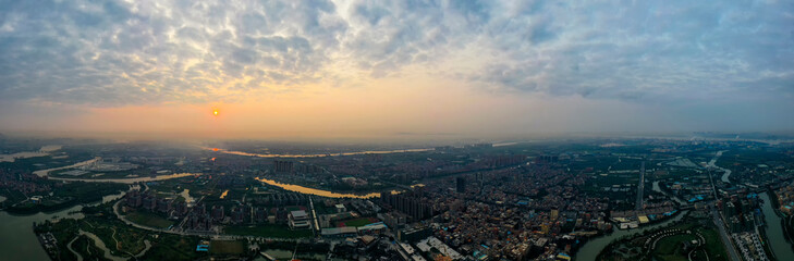Fototapeta premium Aerial photo of sunrise scenery of Huayang Lake Wetland Park in Dongguan, China