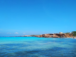 sandy beach for summer balearic holidays in cala saona in formentera island