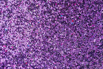 Violet sparkles close up. Bright festive background for sites and layouts