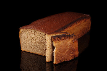Loaf of dark rye bread isolated