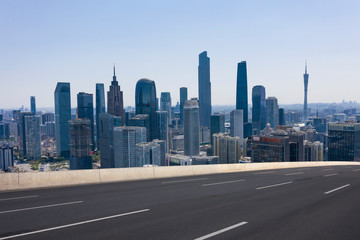 Obraz na płótnie Canvas Expressway with urban scenery background in Guangzhou
