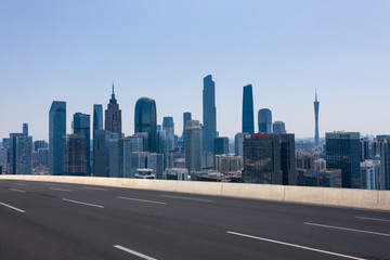 Fototapeta na wymiar Expressway with urban scenery background in Guangzhou