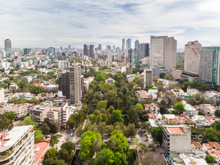Aerial panoramic view of Parque Lincoln, and its surrounding skyline, in Polanco, CDMX. 