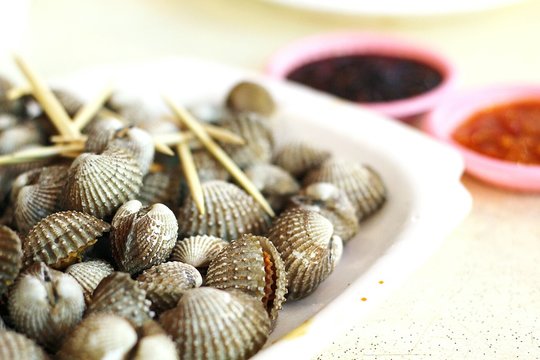 Close-up Of Cockles In Plate On Table