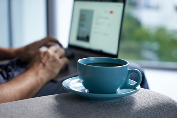 Home office with a cup of coffee