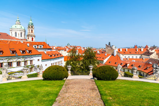 Vrtbovska Garden in Prague. Terraced baroque garden and overview of Lesser Town with St Nicholas Church dome, Prague, Czech Republic