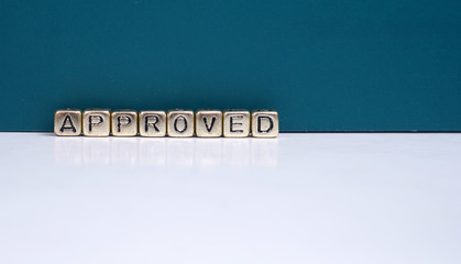 Approved on gold block cube