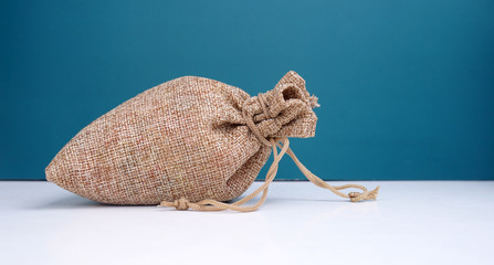 sack on green background 