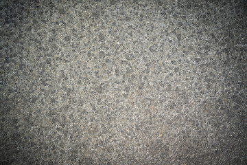 rough marbled natuural stone background texture with radial gradient and copy space