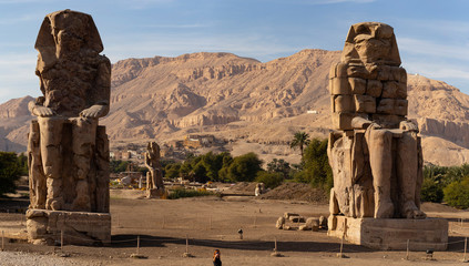 Colossi of Memnon are two massive stone statues Pharaoh Amenhotep III, who reigned in Egypt during the Dynasty XVIII.