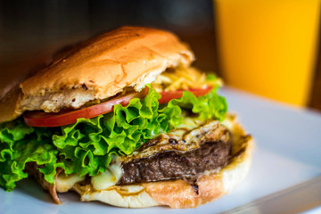 Burger with lettuce and tomato