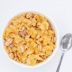 cereal in a white bowl on white background. Healthy breakfast concept.