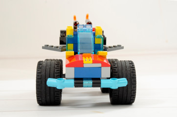 toy truck , made from brick, block on a white background