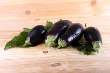 Aubergines on table