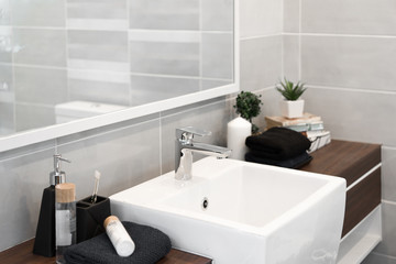 Bathroom interior with sink and faucet