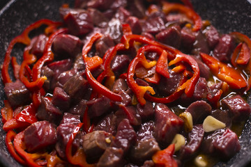  Grilled meat with pepper in a pan