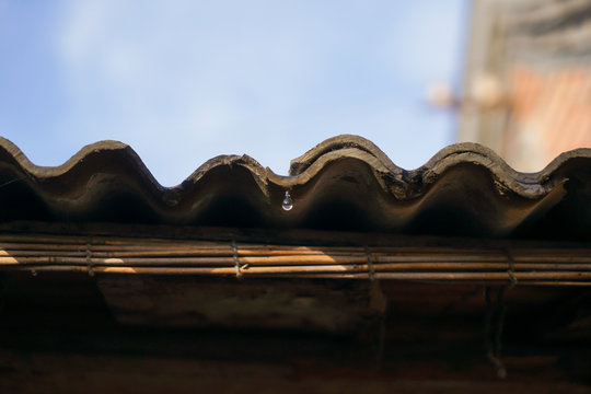 Raindrops Sliding Down The Eaves