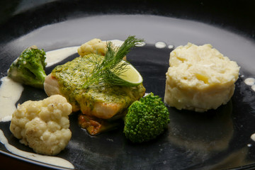 Tuna in lemon dill sauce. Exquisite dish, creative restaurant meal concept.