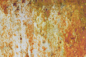 Multicolored background: rusty metal surface with flaking and cracking texture.