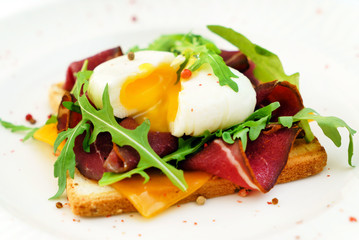 breakfast with poached egg and tast