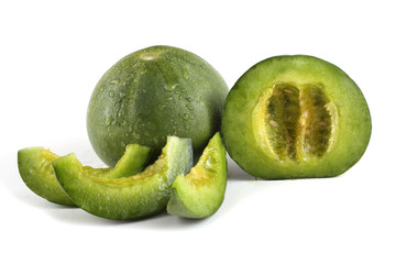 Melon, half and slices isolated on white