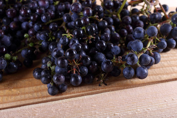 Black wine grape on table