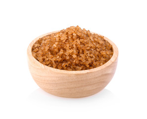Crystals cane sugar, brown caramel cane sugar isolated on white background