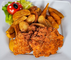platter with french fries, crispy, sauces, vegetables, burger, salads and bread